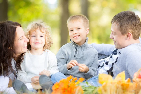 Family having picnic in autumn — Stock Photo, Image