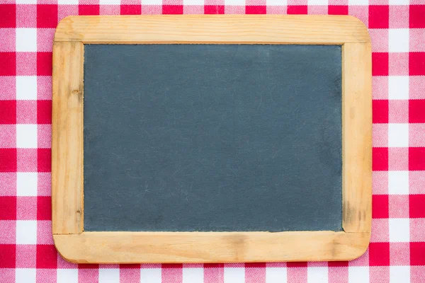 Vintage blackboard on gingham — Stock Photo, Image