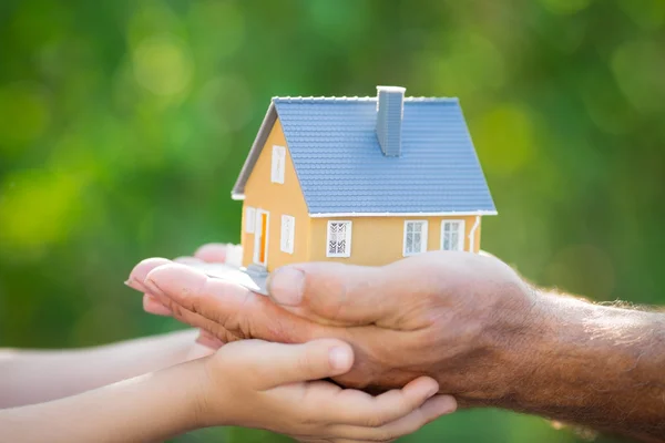 Ecology house in hands — Stock Photo, Image