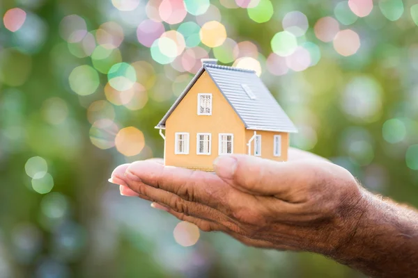 Ecology house in hands — Stock Photo, Image