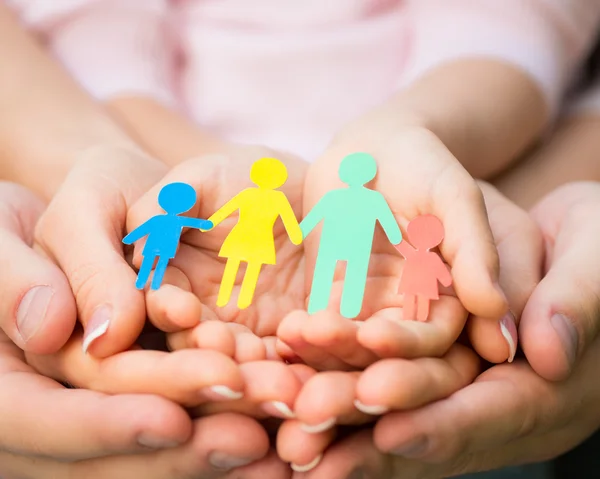 Paper family in hands — Stock Photo, Image