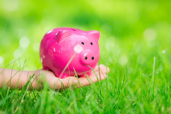 Piggybank in hand — Stock Photo, Image