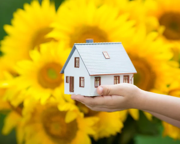 House in childrens hands — Stock Photo, Image