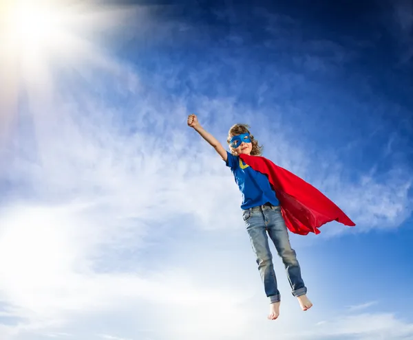 Superhero kid flying — Stock Photo, Image