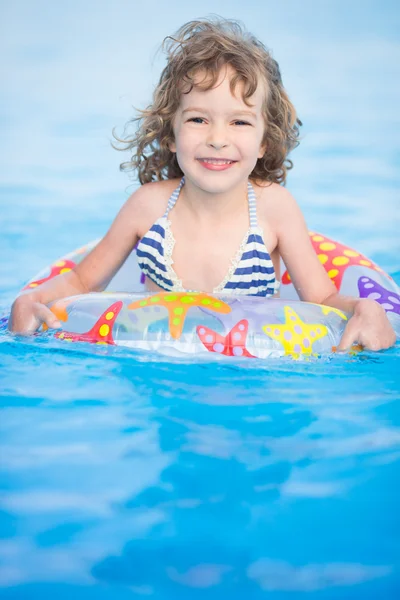 Child in swimming pool Royalty Free Stock Images