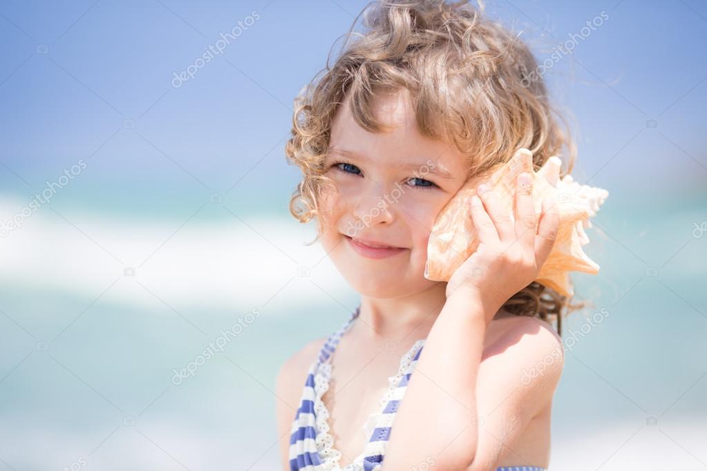 Child with seashell
