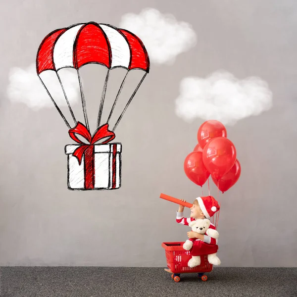 Happy Child Wearing Christmas Costume Kid Sitting Shopping Cart Red — Stock Photo, Image