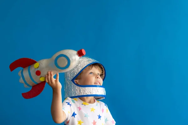 Happy Child Playing Toy Rocket Blue Background Kid Pretend Astronaut — Stock Photo, Image