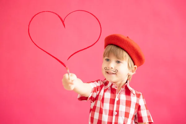 Happy Child Painting Red Heart Portrait Smiling Kid Pink Background Stock Picture