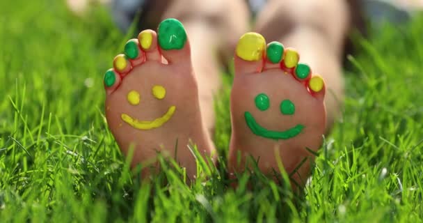 Happy Child Painting Smile Feet Green Spring Background Funny Kid — Stock Video