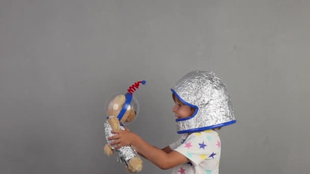 Happy Child Playing Teddy Bear Funny Kid Pretend Astronaut Imagination — Stockvideo