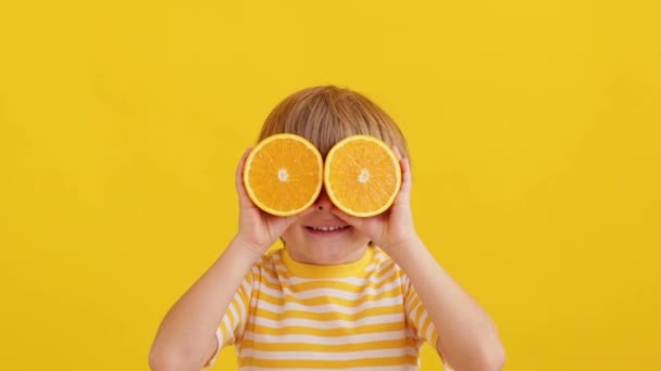 Surprised Child Holding Halves Orange Fruit Sunglasses Funny Kid Yellow — Wideo stockowe