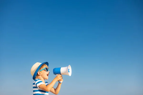 Happy Child Shouting Loudspeaker Outdoor Blue Sky Background Portrait Smiling — Fotografia de Stock