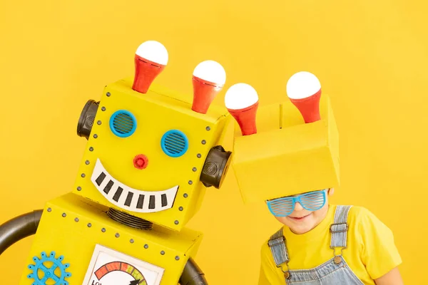 Happy Child Robot Yellow Background Funny Kid Playing Home Success — Stockfoto