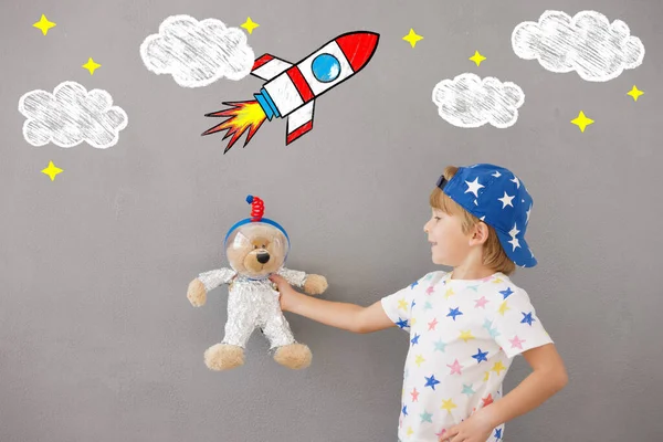 Happy Child Playing Teddy Bear Home Kid Pretend Astronaut Imagination — Stock Photo, Image