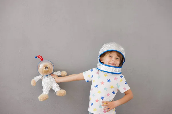 Happy Child Playing Teddy Bear Home Kid Pretend Astronaut Imagination — Stock Photo, Image