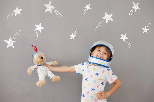 Happy Child Playing Teddy Bear Home Kid Pretend Astronaut Imagination — Stock Photo, Image