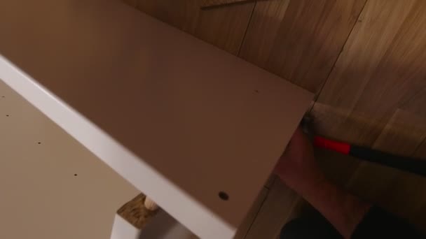 Man Repairing Home Furniture — Stockvideo