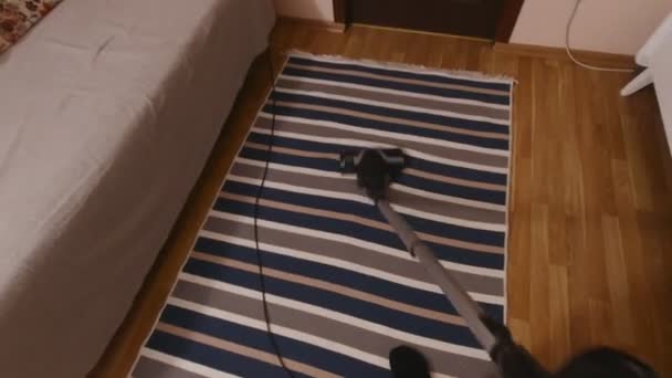 Man Vacuuming Carpet POV — Stockvideo