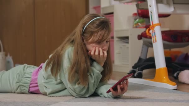 Girl Bored With Phone — Vídeo de Stock