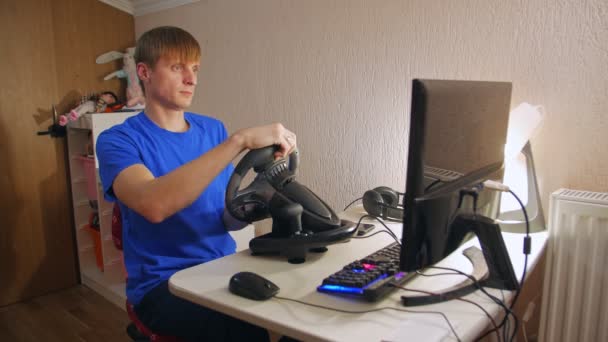 Man Playing Racing On Wheel — Stock video