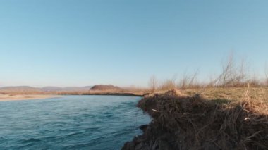Man On The River Bank Slow Motion