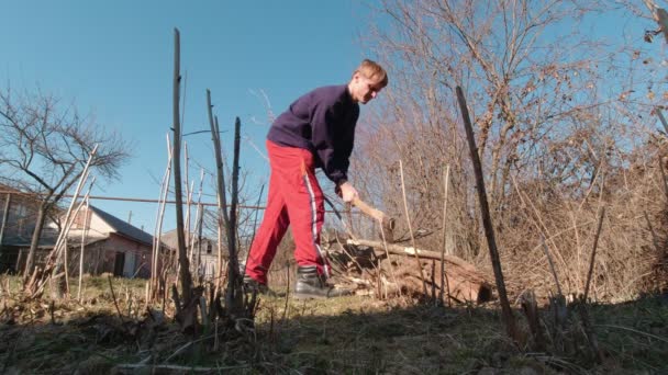 Man Chopping With An Ax Slow Motion — Stock Video