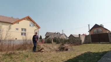 Man Fixing An Ax Slow Motion