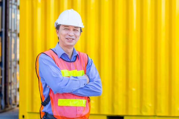 Smiling Man Hard Hat Standing Crossed Arms Container Cargo Site — Foto Stock