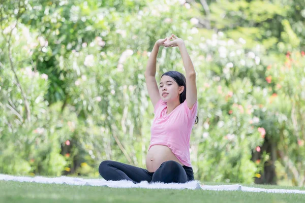 Cheerful Pregnant Woman Sitting Relax Park Stretching Muscles — 스톡 사진