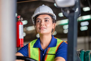 Female worker on forklift, Manual workers working in warehouse, Worker driver at warehouse forklift loader works