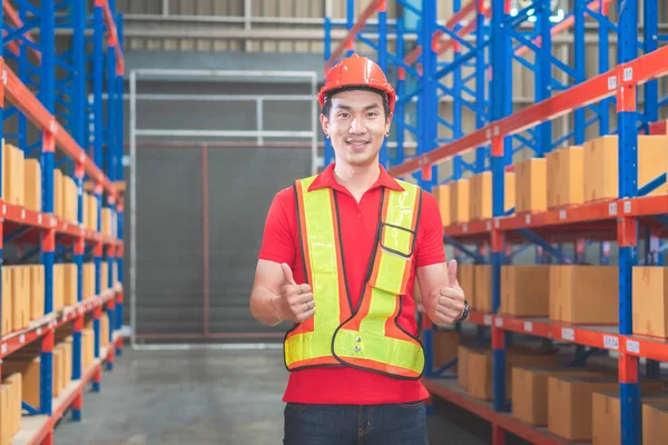 Cheerful Male Worker Hardhat Smiling Giving Thumbs Warehouse Worker Working — Φωτογραφία Αρχείου