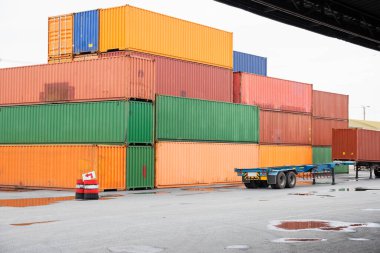 Stacked containers in the container terminals, Industry and Transportation concepts