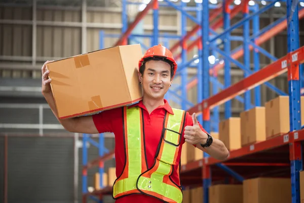 Male Worker Hardhat Holding Cardboard Box Walking Retail Warehouse Warehouse — 스톡 사진