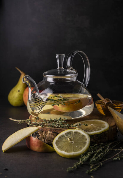 selective focus, freshly brewed tea in a transparent teapot