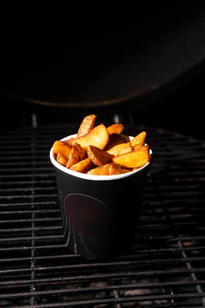 Selective Focus French Fries Salt Spices Craft Black Mock Cup — Stock Photo, Image