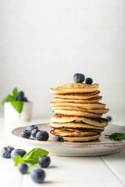 Sweet pancakes for breakfast in a stack Royalty Free Stock Images