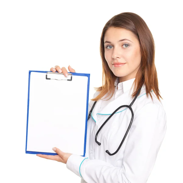 Portrait of young female doctor showing a blank paper sheet on c — Stock Photo, Image