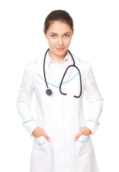 Portrait of young female doctor with arms crossed isolated on wh — Stock Photo, Image