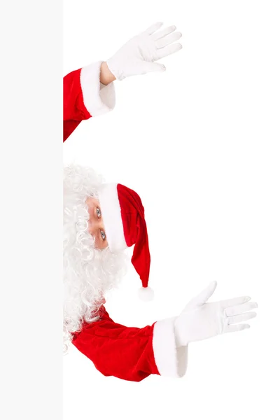 Santa Claus is looking out of white board isolated on white back — Stock Photo, Image