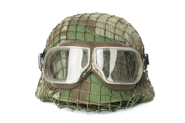 Camouflaged helmet with protective goggles — Stock Photo, Image