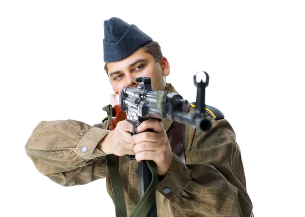 Soldier shoots submachine gun — Stock Photo, Image
