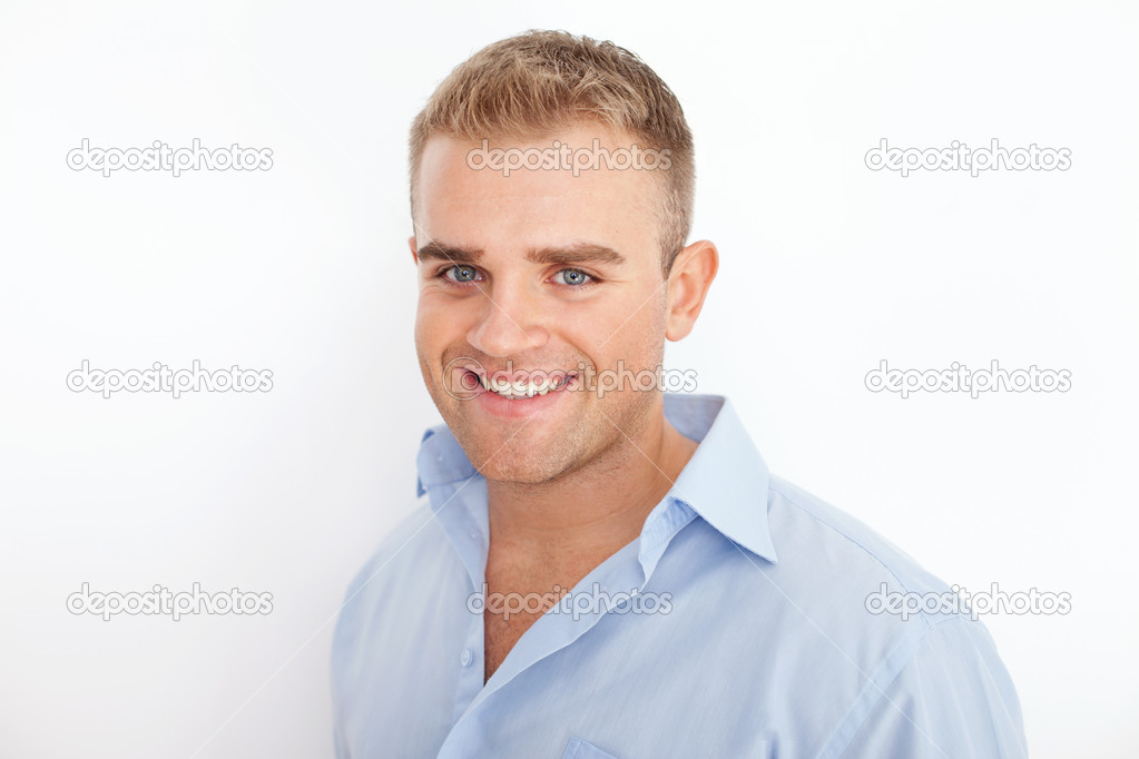 Closeup portrait of happy smiling young businessman