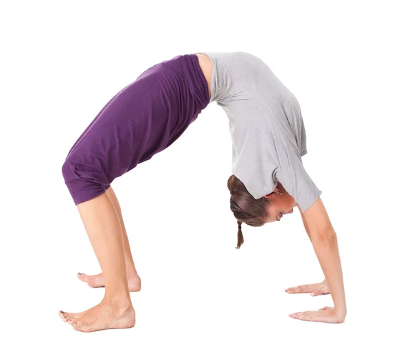 Young woman doing yoga exercise " Wheel Pose" — Stock Photo, Image