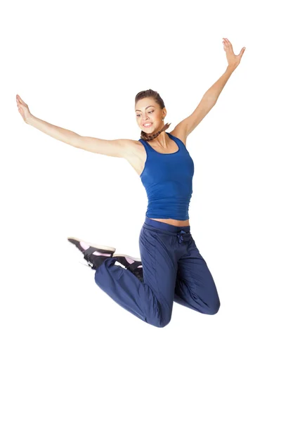 Молода здорова фітнес жінка стрибає ізольовано на білому — стокове фото