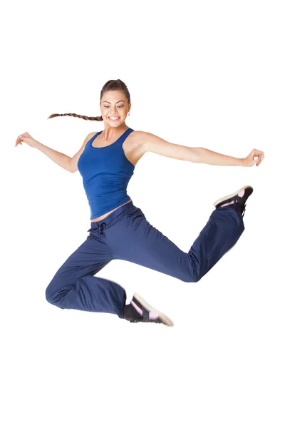 Giovane donna sana fitness salto isolato su bianco — Foto Stock