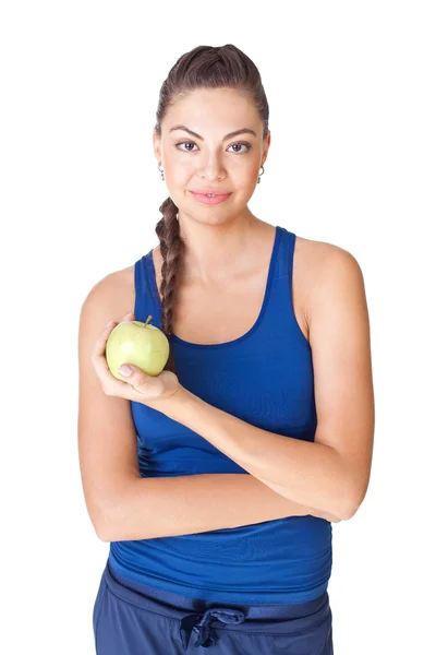 Fitness mujer sosteniendo manzana aislada sobre fondo blanco — Foto de Stock