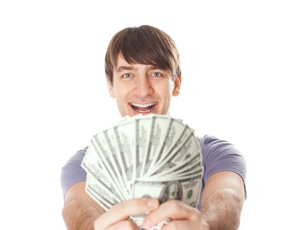 Young smiling man holding a dollar bills isolated on white backg — Stock Photo, Image