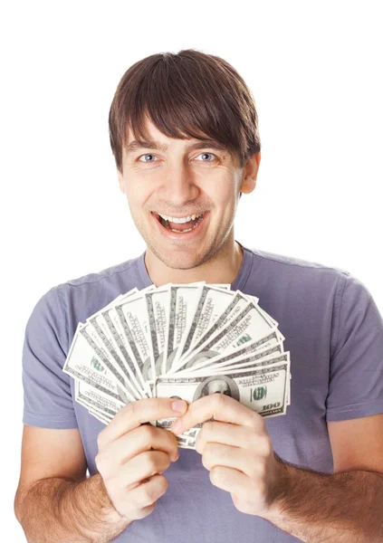 Young smiling man holding a dollar bills isolated on white backg — Stock Photo, Image