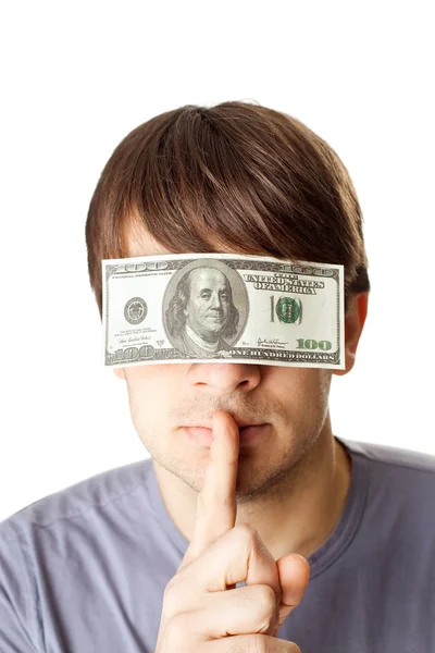 Young man with eyes sealed by a hundred dollar bills — Stock Photo, Image